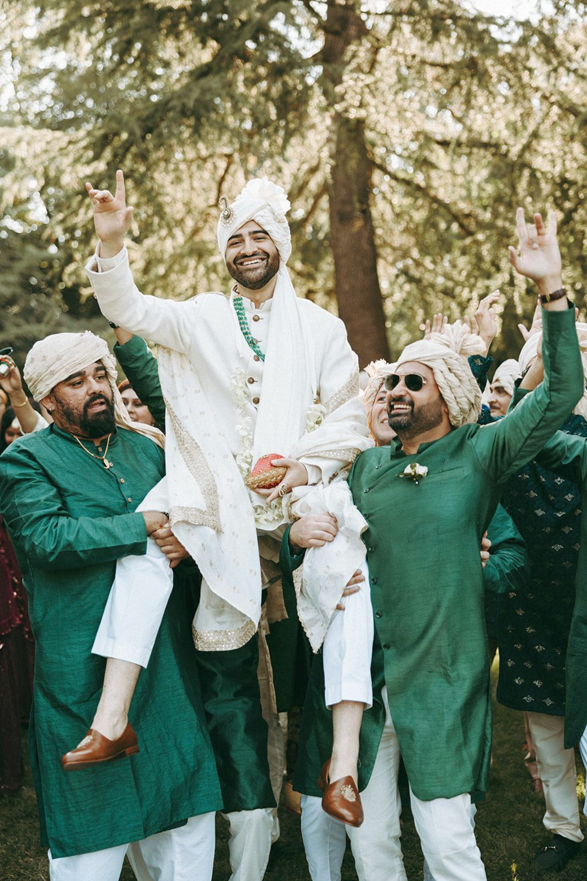 outdoor-garden-hindu-wedding-tent-greenery-groom-baraat-dancing