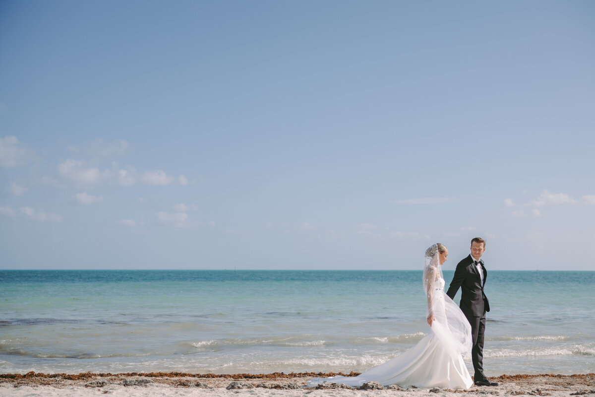 Couple Walking along the ocean in Key West Florida