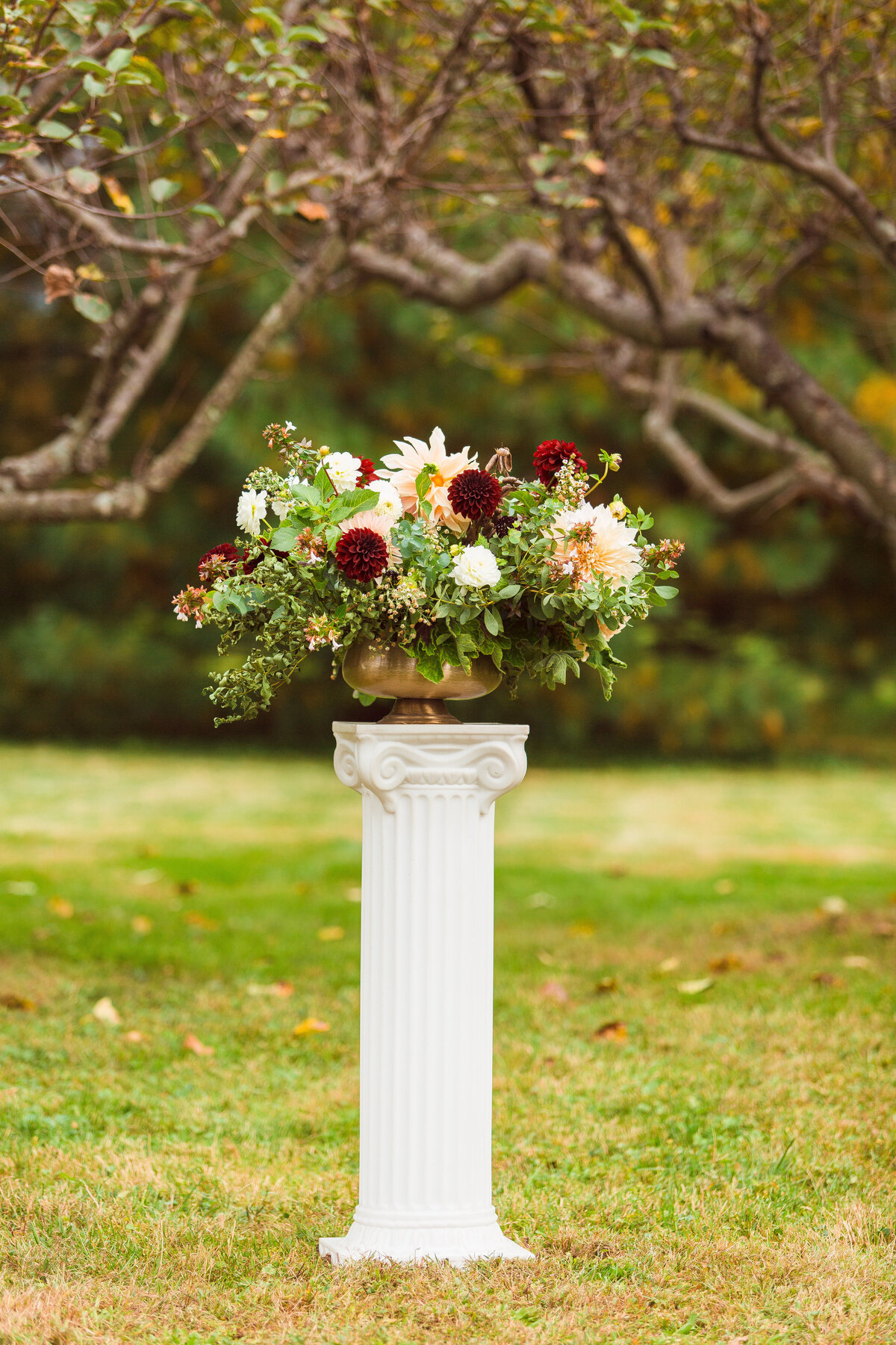 Wedding ceremony floral pillar.
