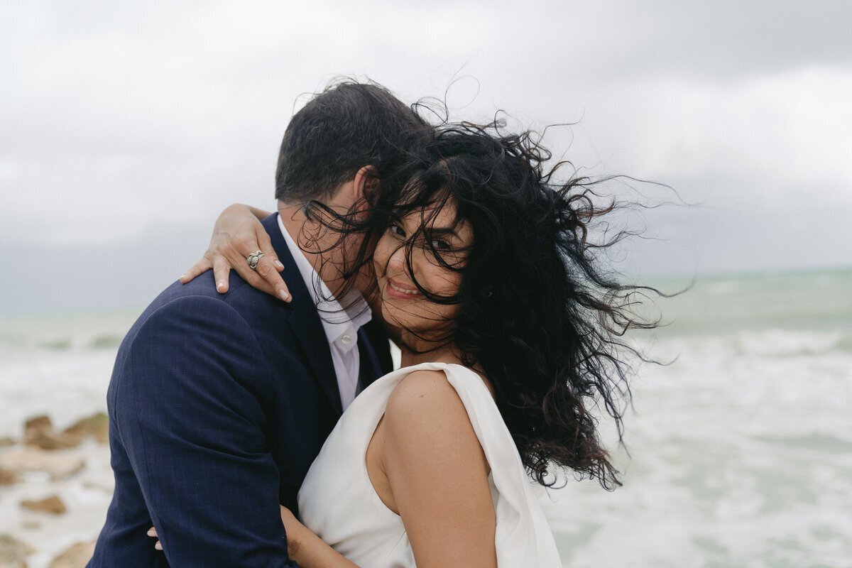 couple on beach taken by film wedding photographers