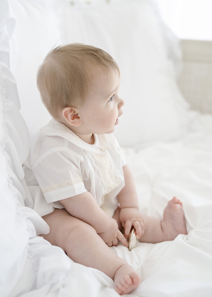 baby boy photographed in a grandmillenial style outfit in brunswick ga photo studio