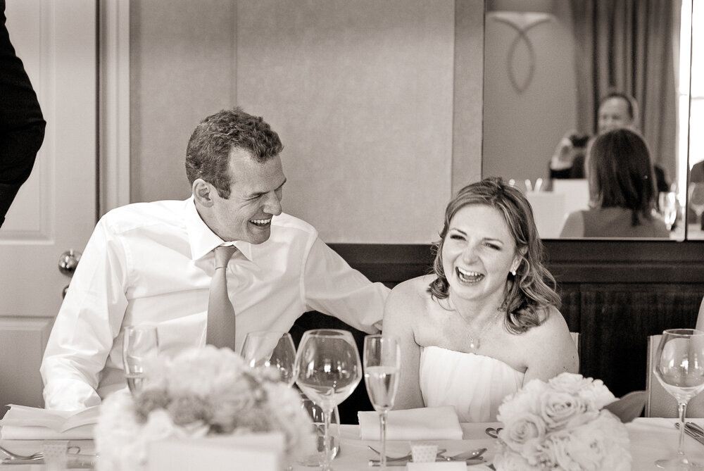 Bride and groom laughing at a funny speech at the bingham Hotel, Richmond