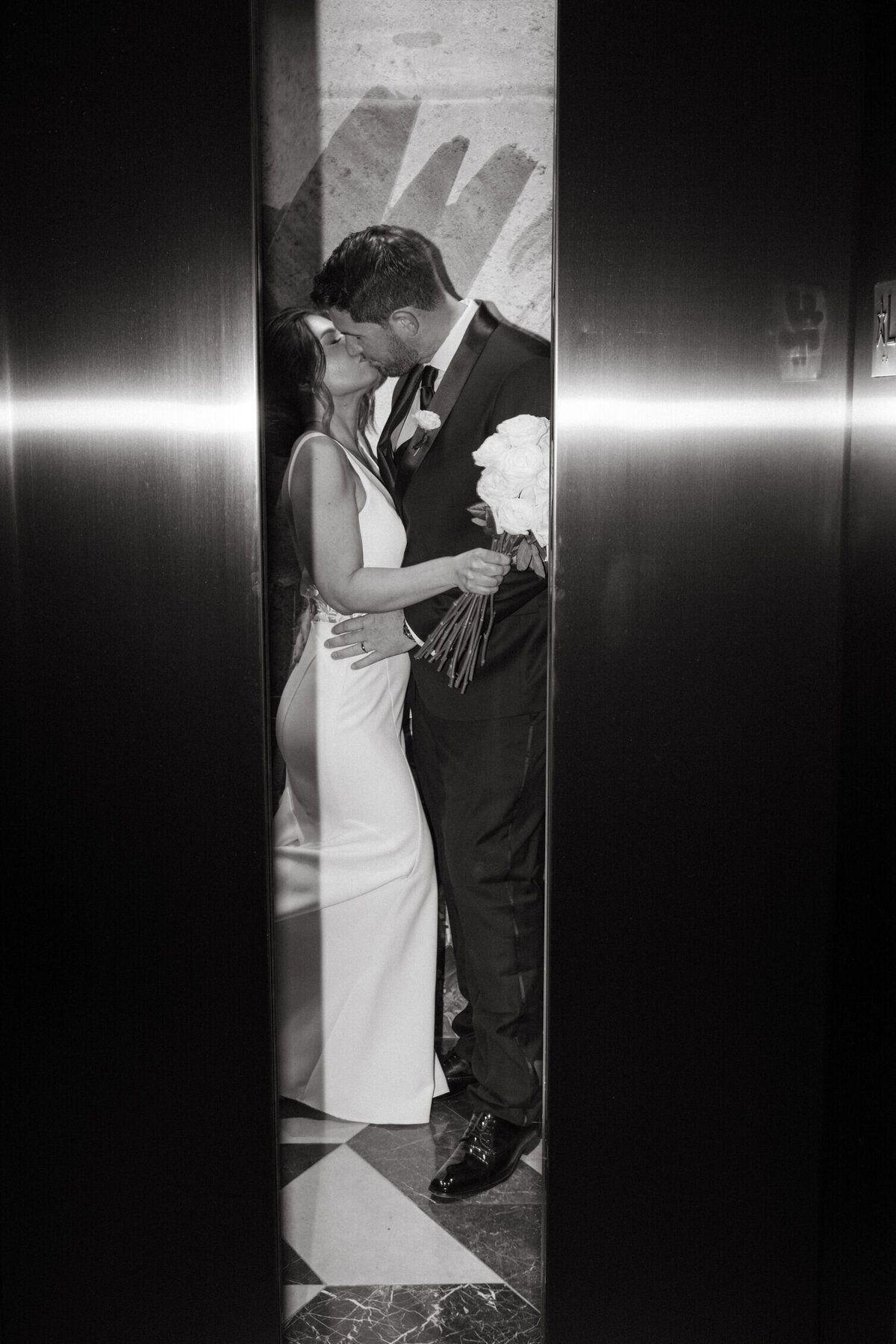 bride-groom-elevator-kiss-6GJ-W