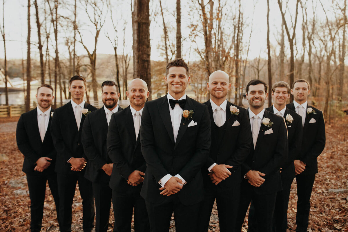 Corey Seager and groomsmen in tuxedos with boutonnieres