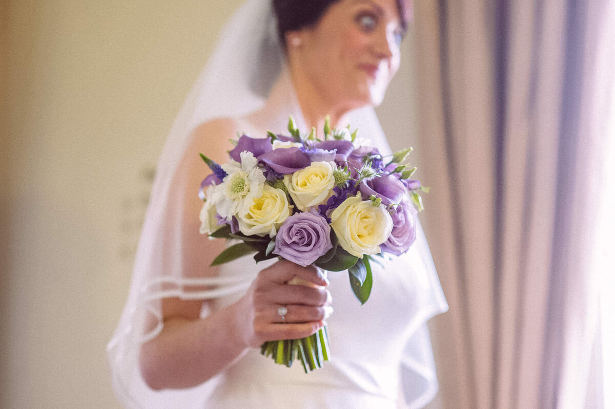 35 bride-with-flowers-kclub-wedding