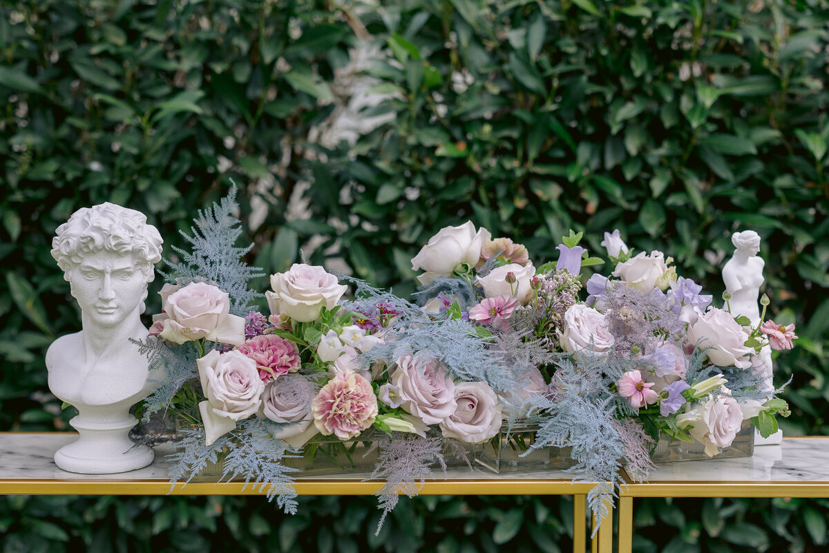 Charlottesville Wedding Photographer paste florals on a table outside of an estate wedding