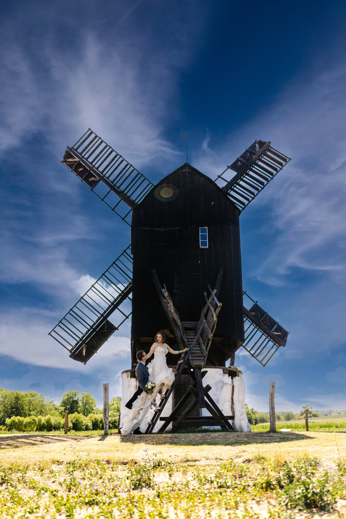 The beautiful windmills that is a beautiful backdrop for a wedding package abroad for 2