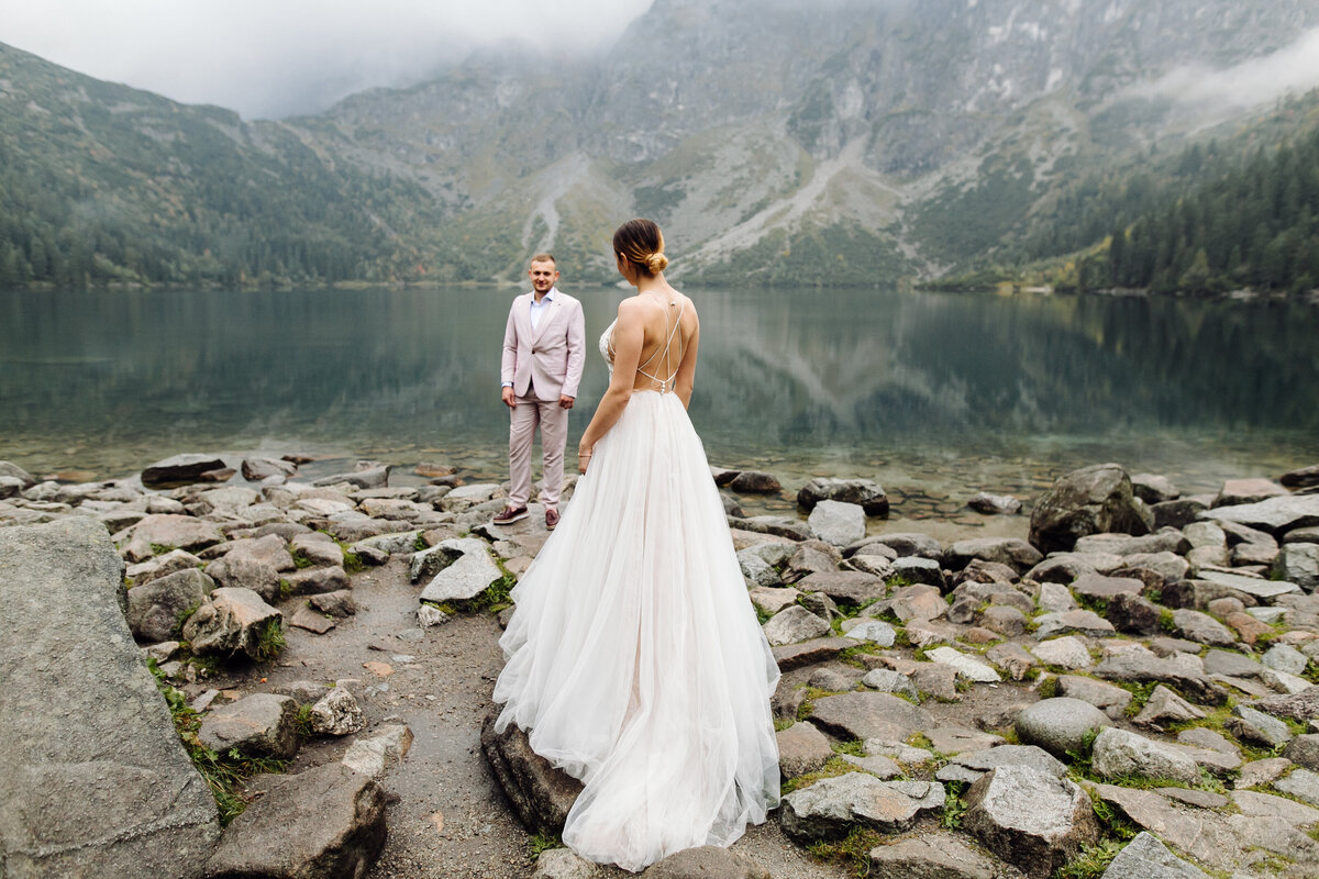 romantic-wedding-couple-love-standing-sea-eye-lake-poland-tatra-mountains