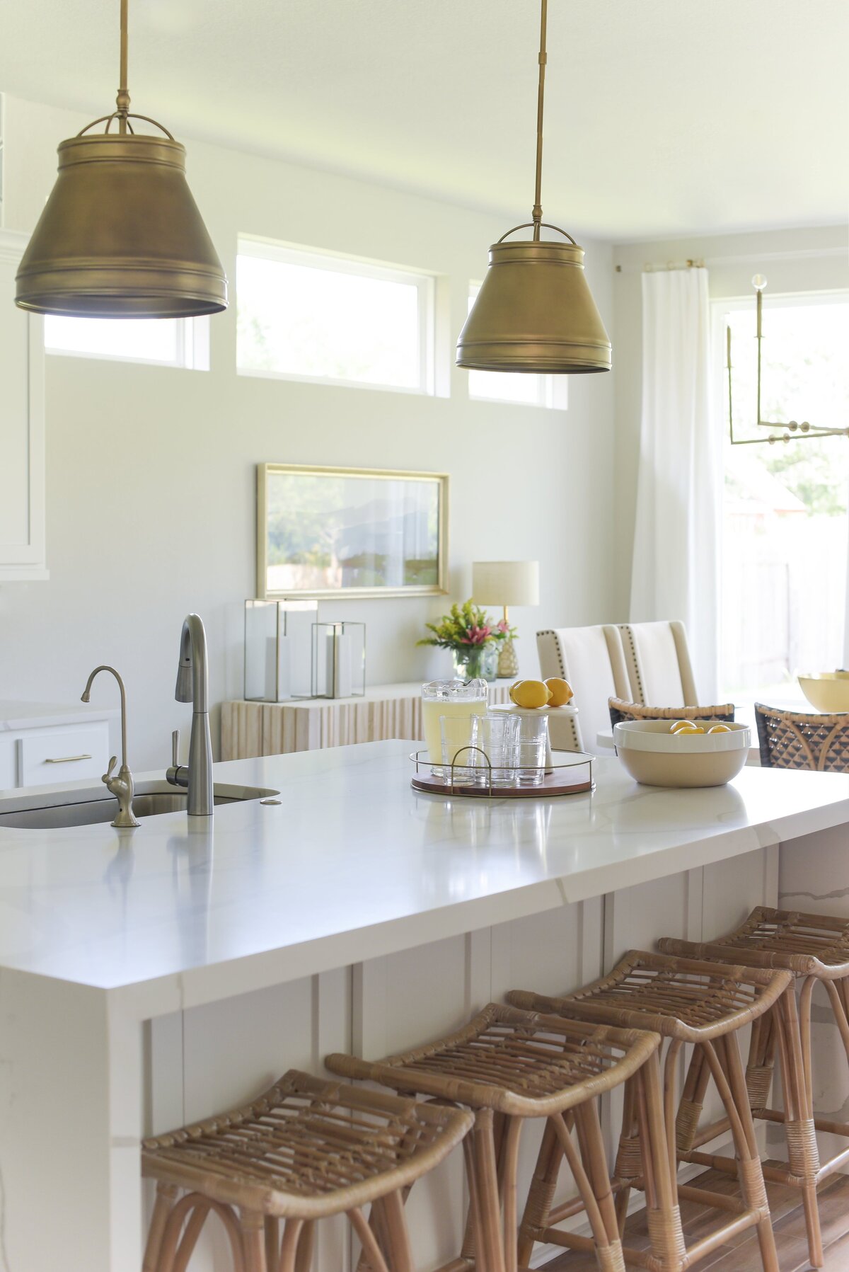 sleek-white-kitchen-waterfall-counter-interior-design-georgetown-texas-4-min