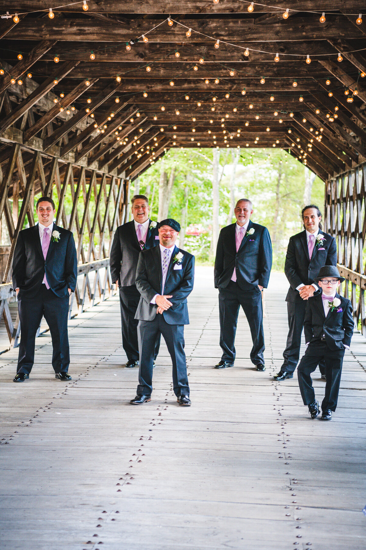 New Hampshire Wedding Photo of Groomsmen under Bull Run lights