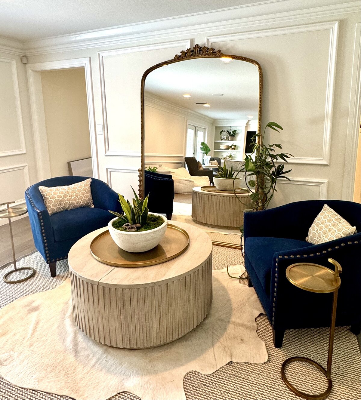 seating area with blue chairs