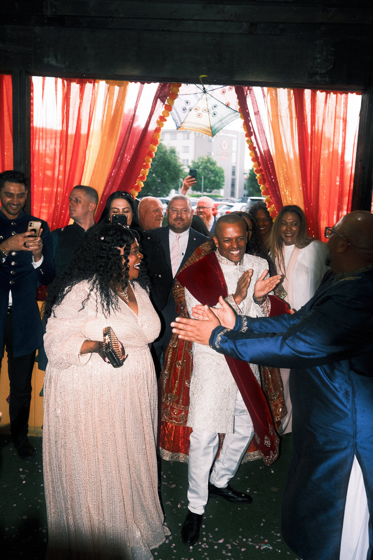 A wedding photo of a groom dancing with his friends in Dublin Ireland