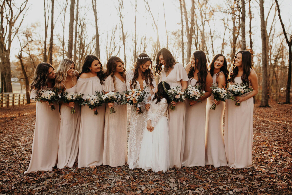 Blush champagne mismatched mix and match bridesmaids dresses  and bouquets