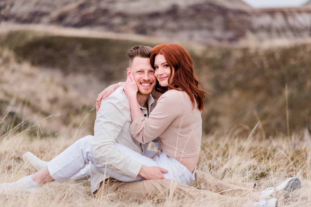 Smiling couple engagement session inspiration in Alberta.
