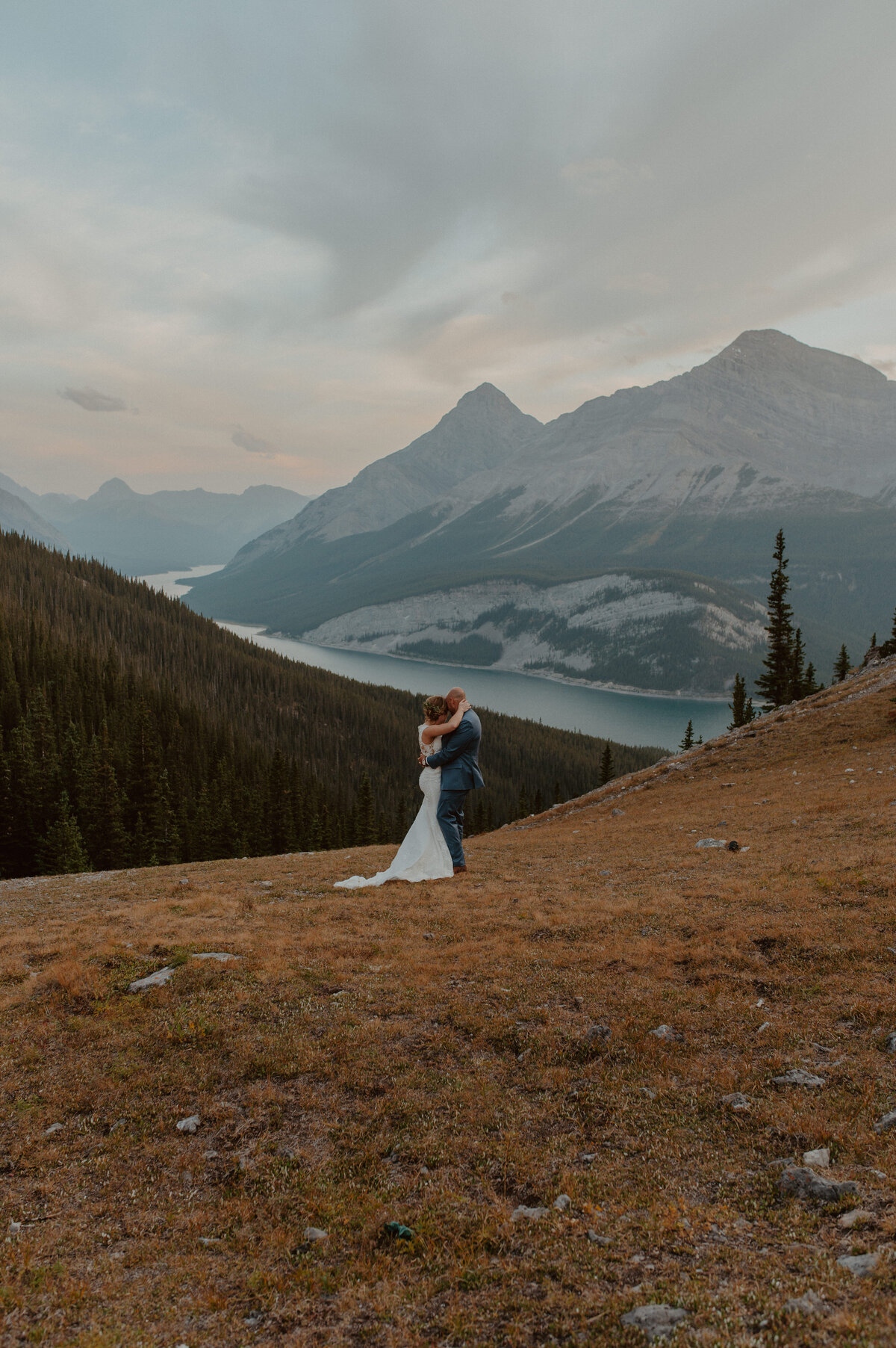 first dance ontop of mountain during elopement in Alberta