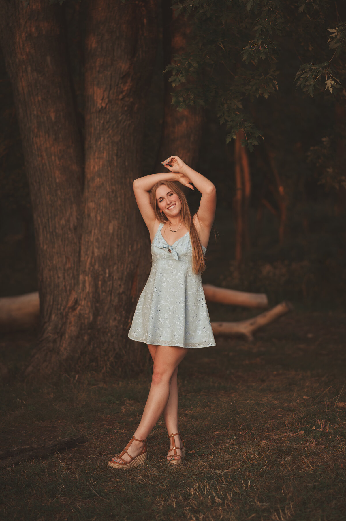 Explore the beauty of Woodbury High School senior portraits with a captivating session at Tamarack Nature Center in White Bear Lake. Discover how nature's elegance frames the essence of a remarkable young woman