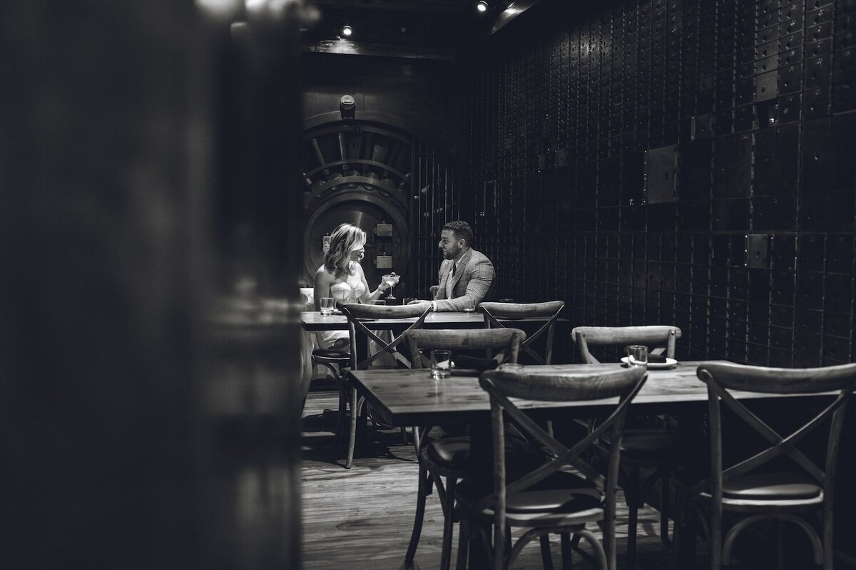 Romantic dinner moment captured inside Felina’s moody dining room.