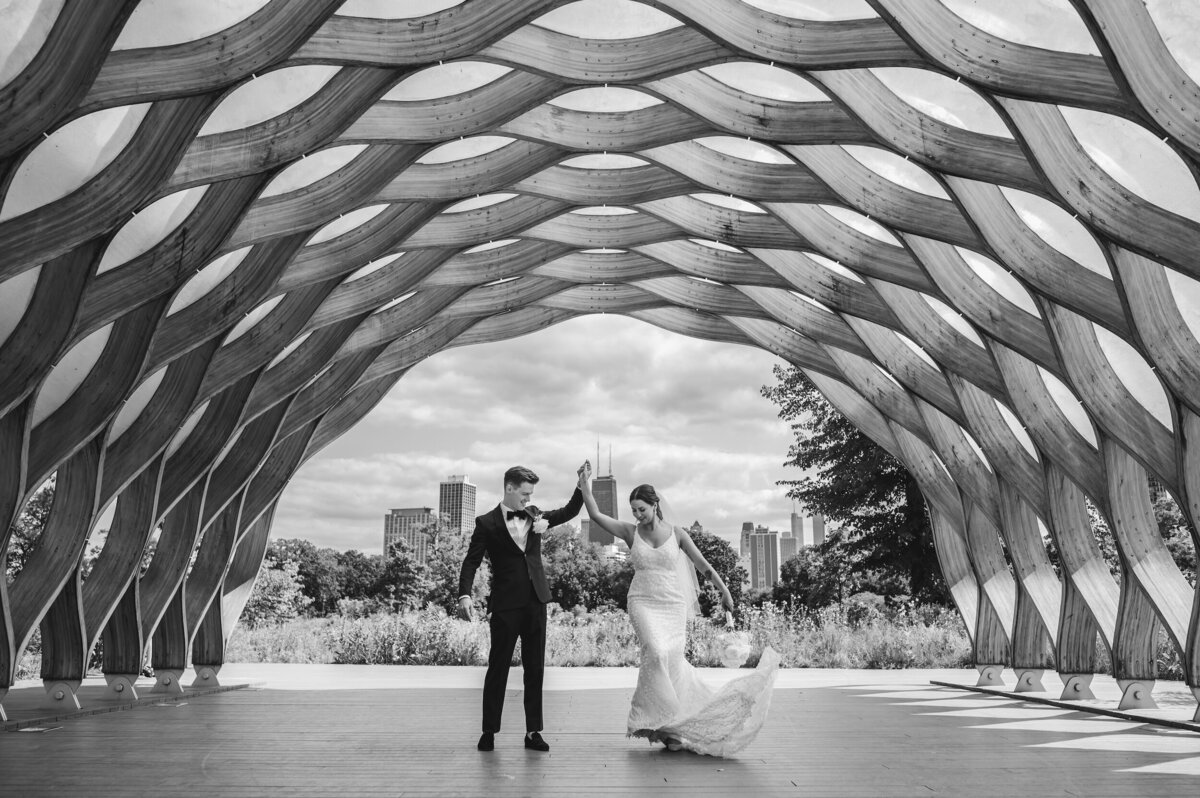 A bride and groom dance underneath the honeycomb in Lincoln Park Chicago.