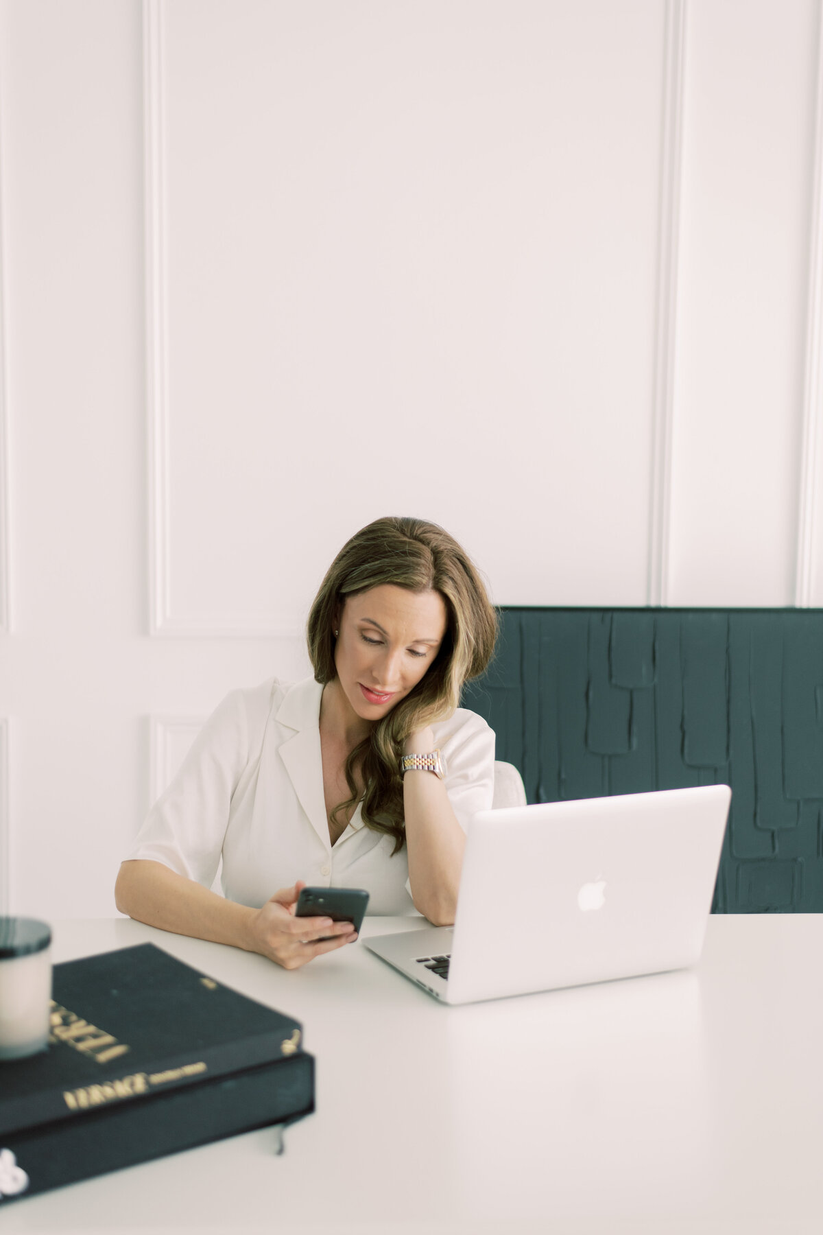 Woman working on phone and in a candid moment