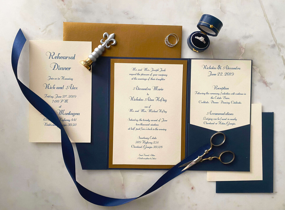 navy-gold-pocket-flat-lay-wedding