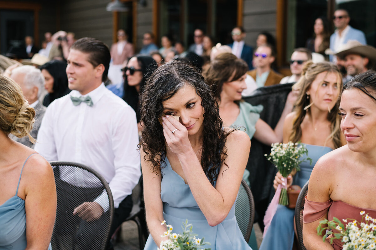 Guests reacting with joy during a wedding ceremony in Denver, captured on film and digital.