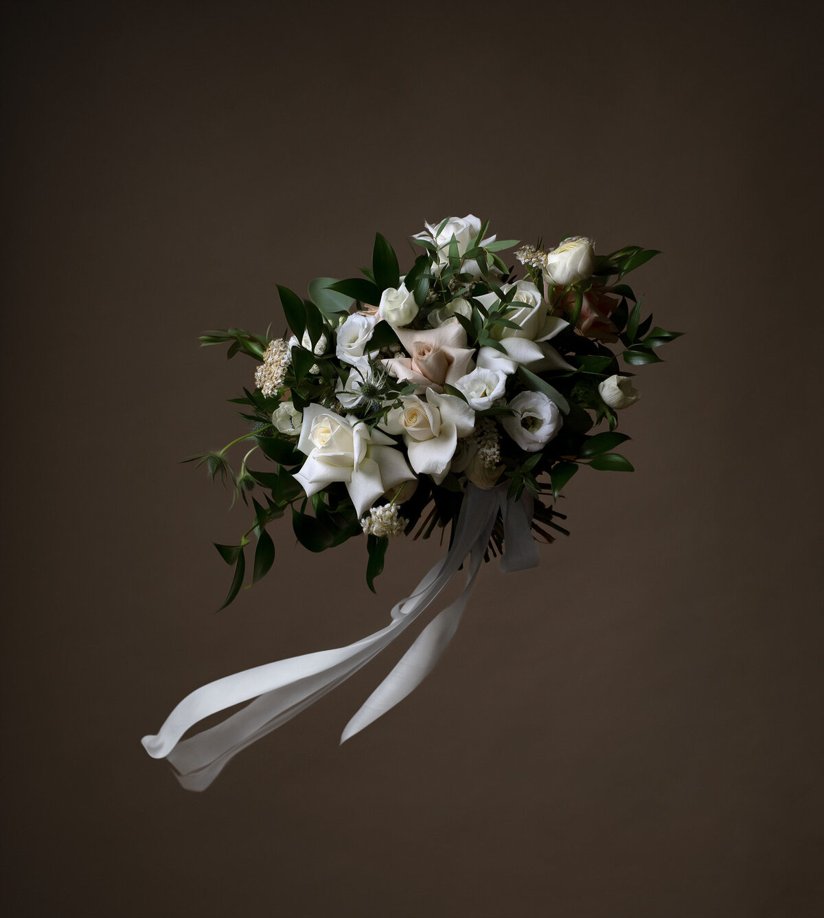 Gorgeous elegant white bouquet by Foxglove Studio, contemporary Calgary, Alberta wedding florist, featured on the Brontë Bride Vendor Guide.