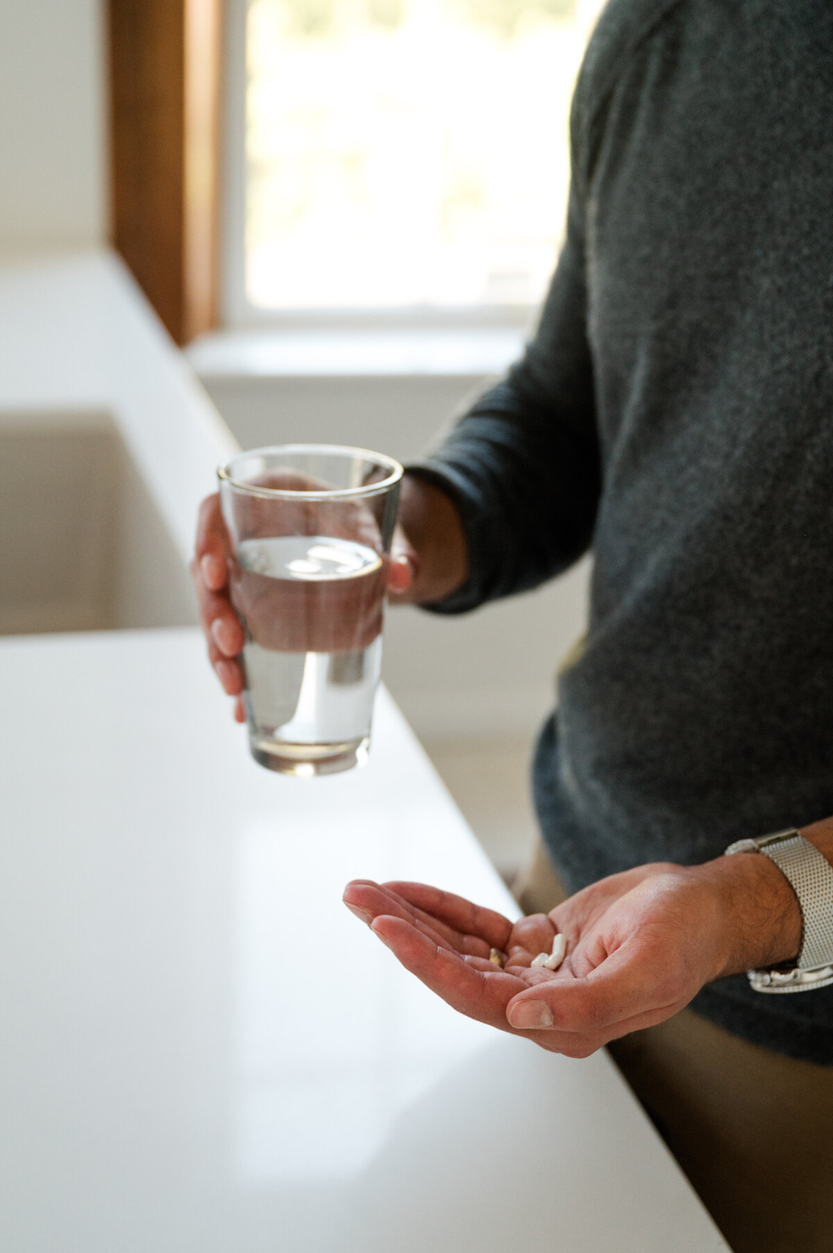 Supplement pills photographed in an lifestyle way for a holistic medical brand