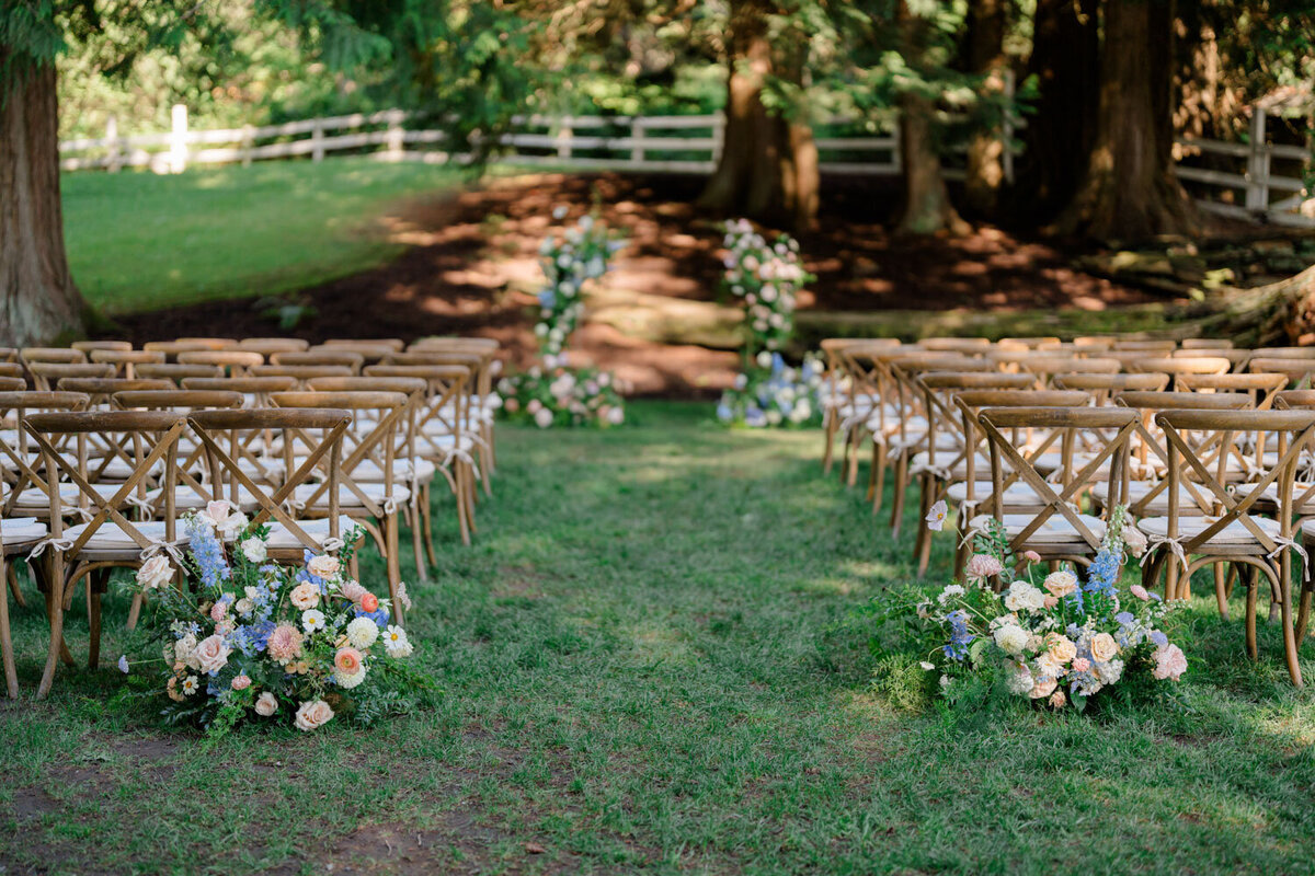 Colorful ceremony set up at the ceremony lawn in chateau lill