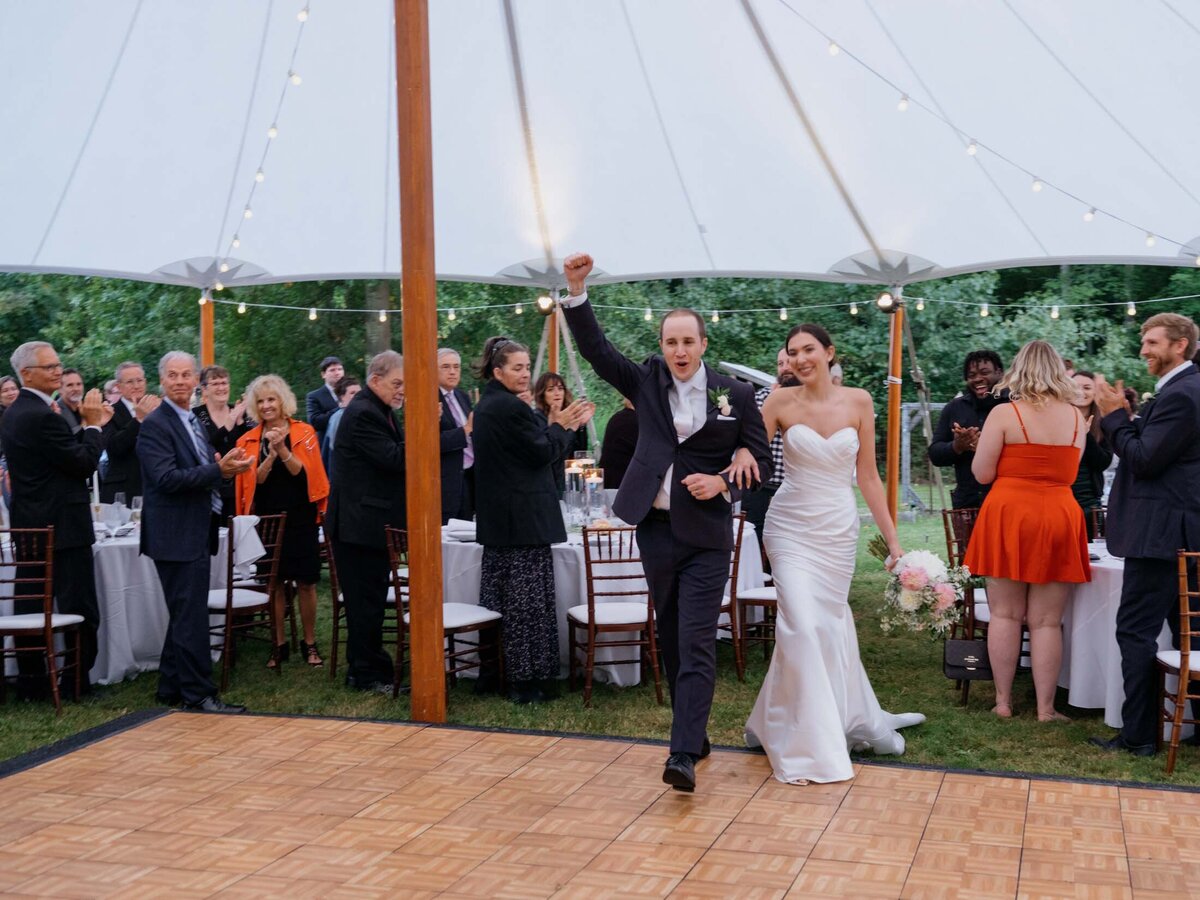 Elegant tented reception at private estate wedding.