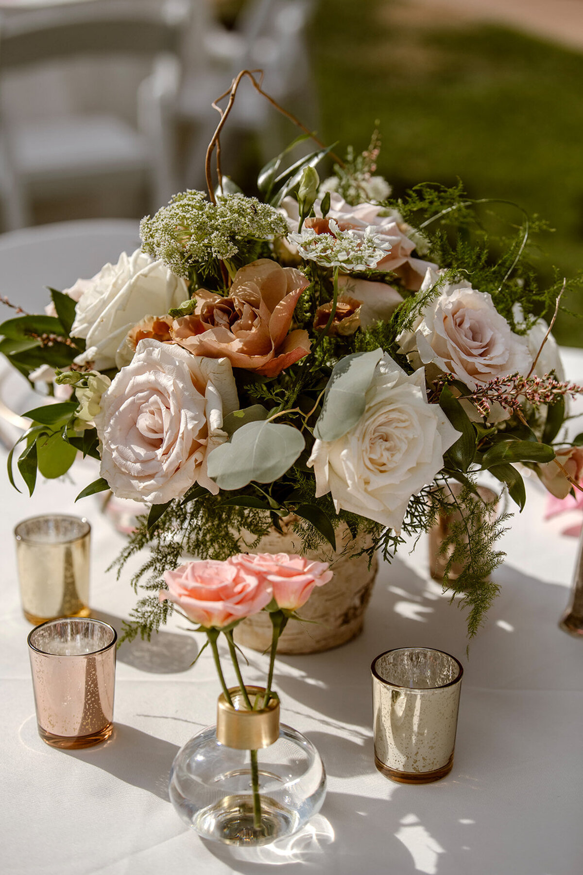 Heather and Doug's wedding reception table set-up with colorful florals