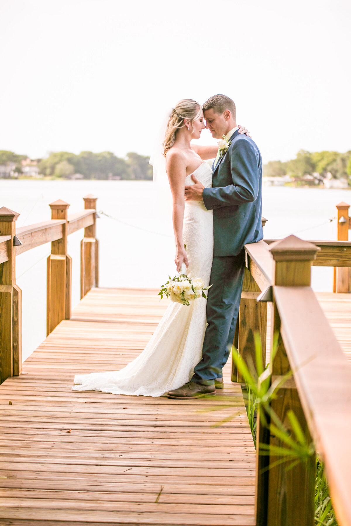 Bride and Groom on dock at Capen House Oralndo Wedding photographer