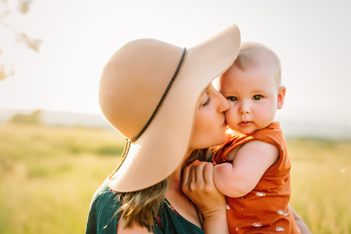 Mom kissing her baby son near Bridgewater, VA