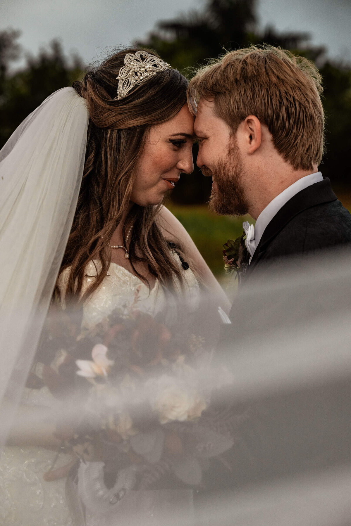 Wedding photo of bride and groom, capturing their joyful moments together on their special day. - photo by Jamie Simmons