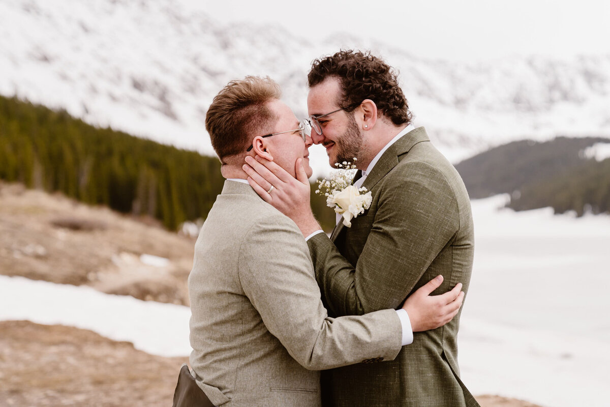 Copper Mountain Colorado elopement with couple standing together against dramatic alpine mountain scenery.