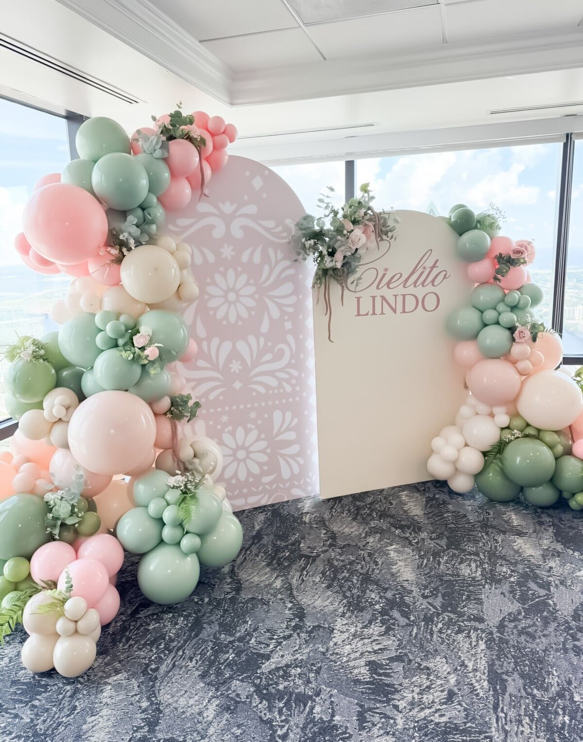 pink and light green baby shower balloons