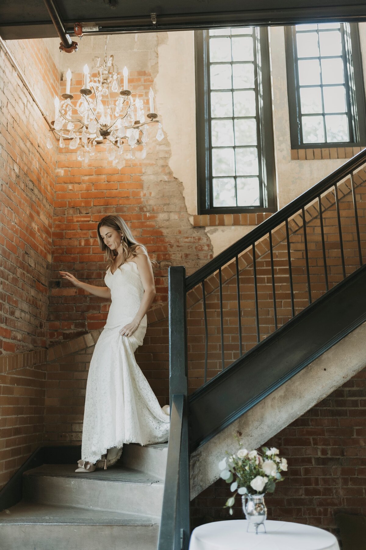 bride walking down staircase