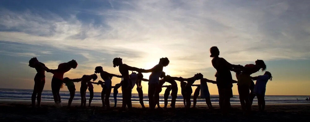 Students practicing heart opening poses during therapeutic yoga teacher training California