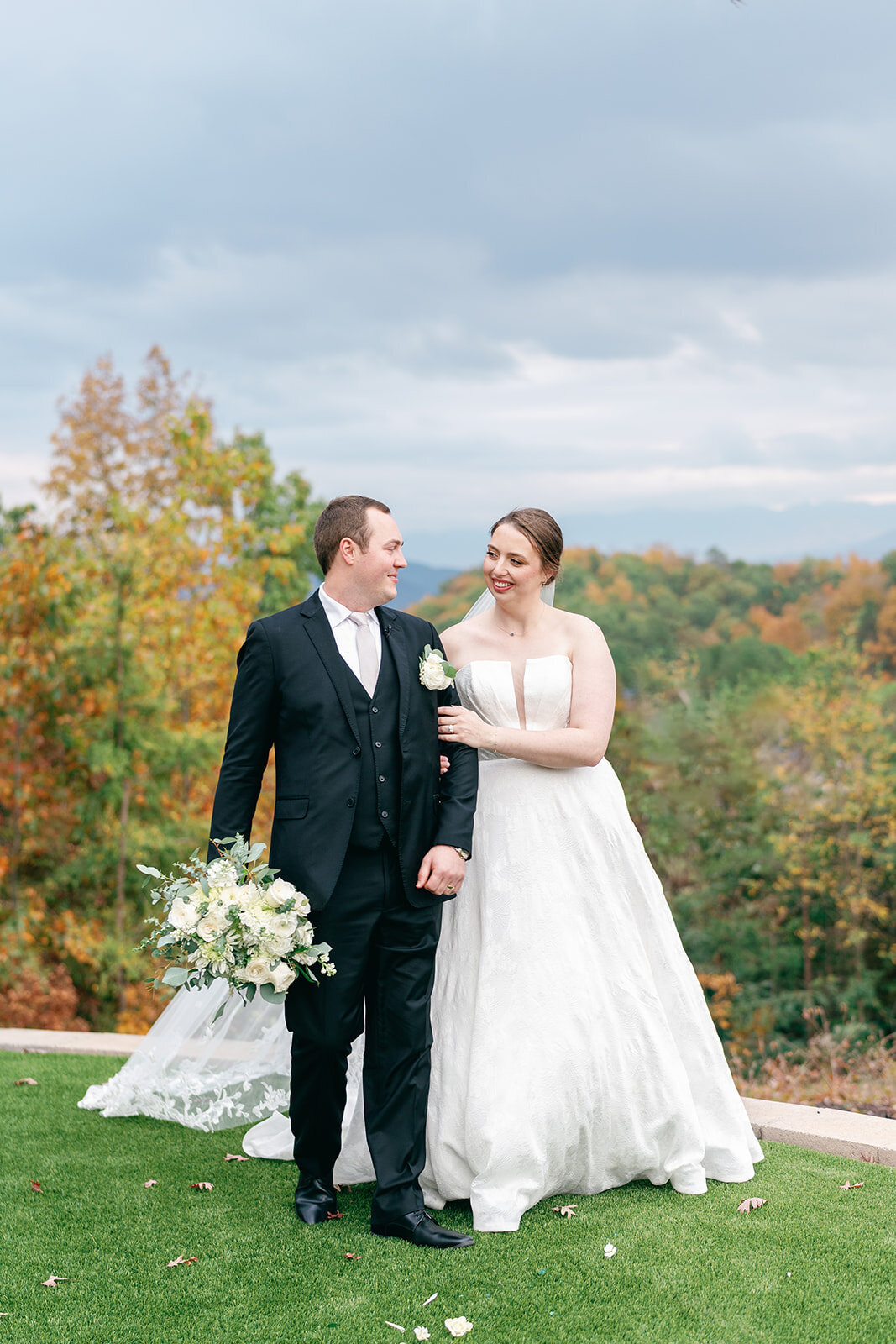 Bride and groom pictures overlooking the mountains at Nichols Heir