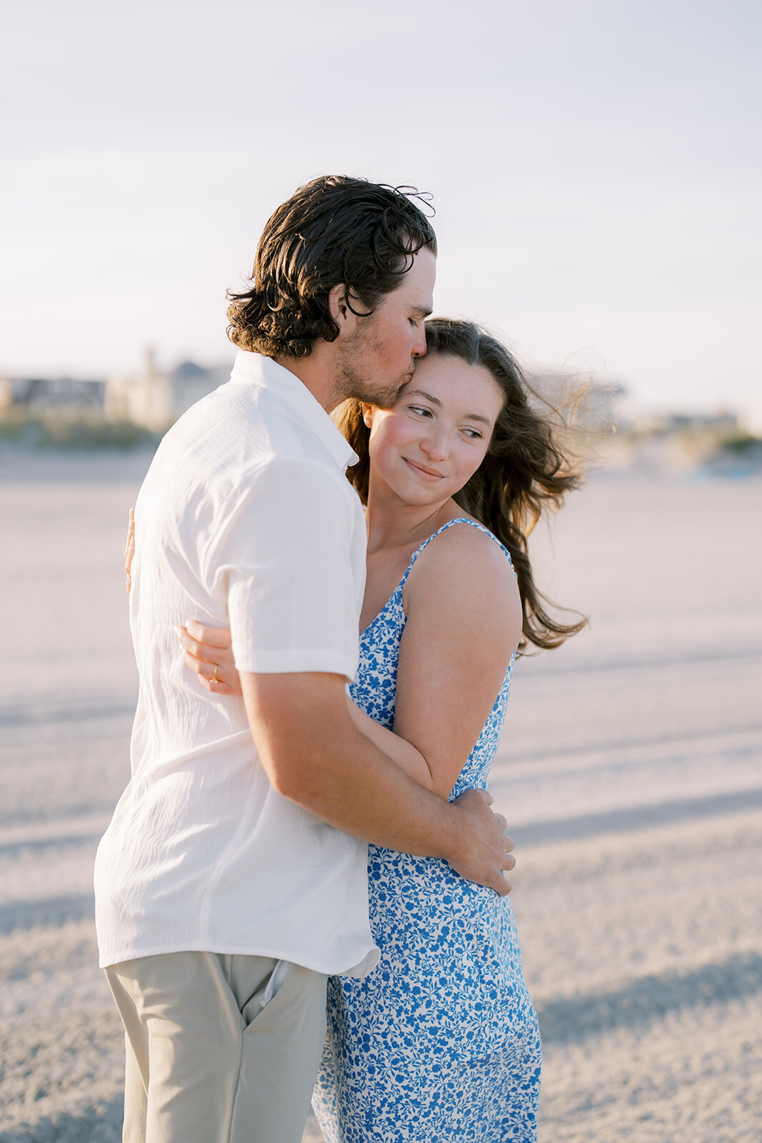 A couple hugging on the beach in Longport, New Jersey