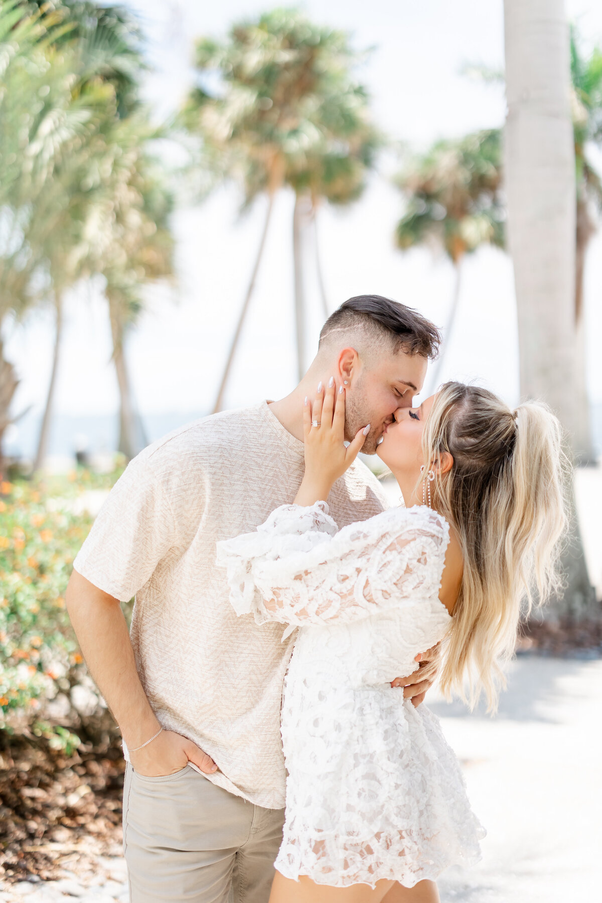 couple kissing near the ocean by wedding photographer in fort lauderdale