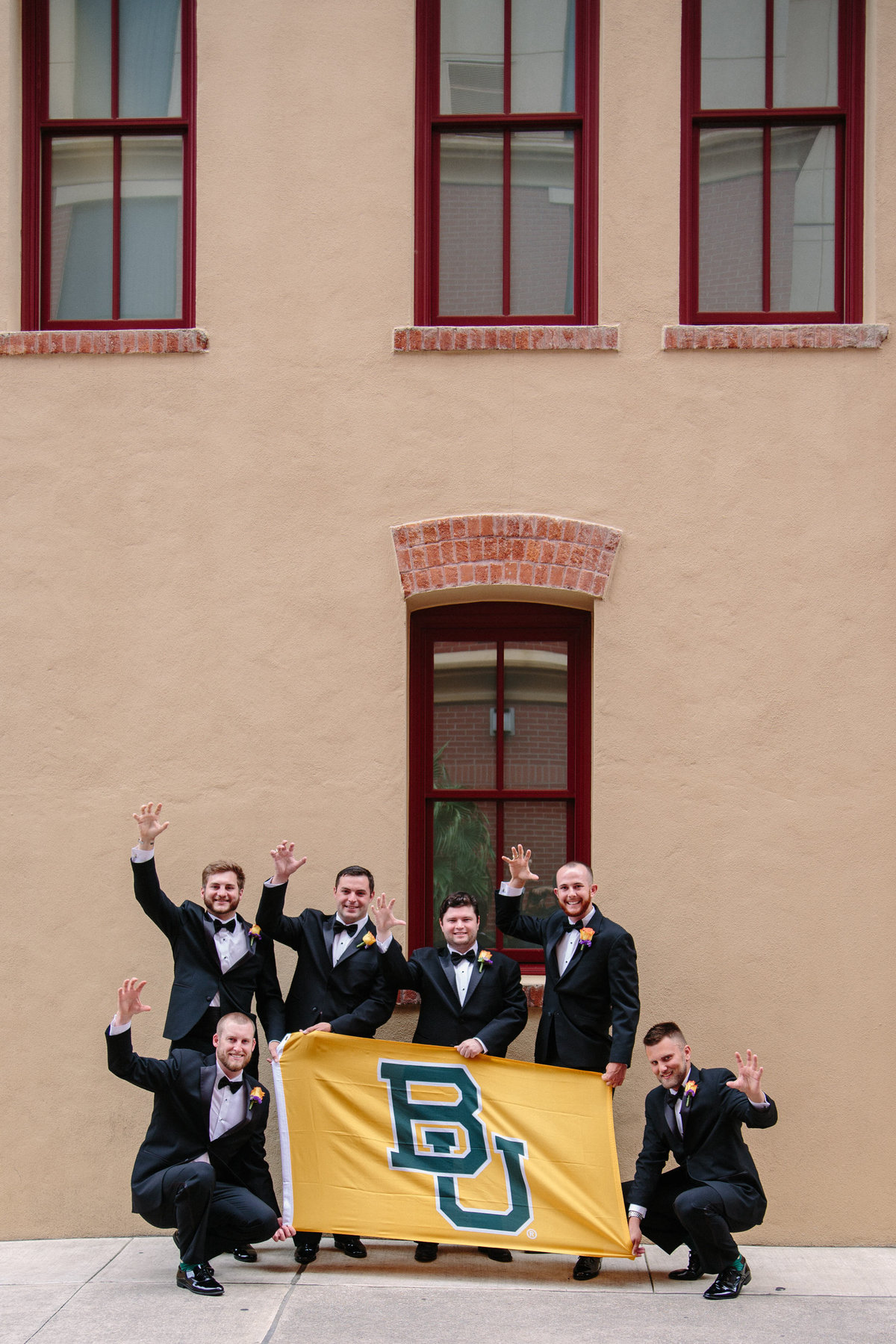 groomsmen from Baylor University attending a wedding in San Antonio posing for Expose The Heart Wedding Photography
