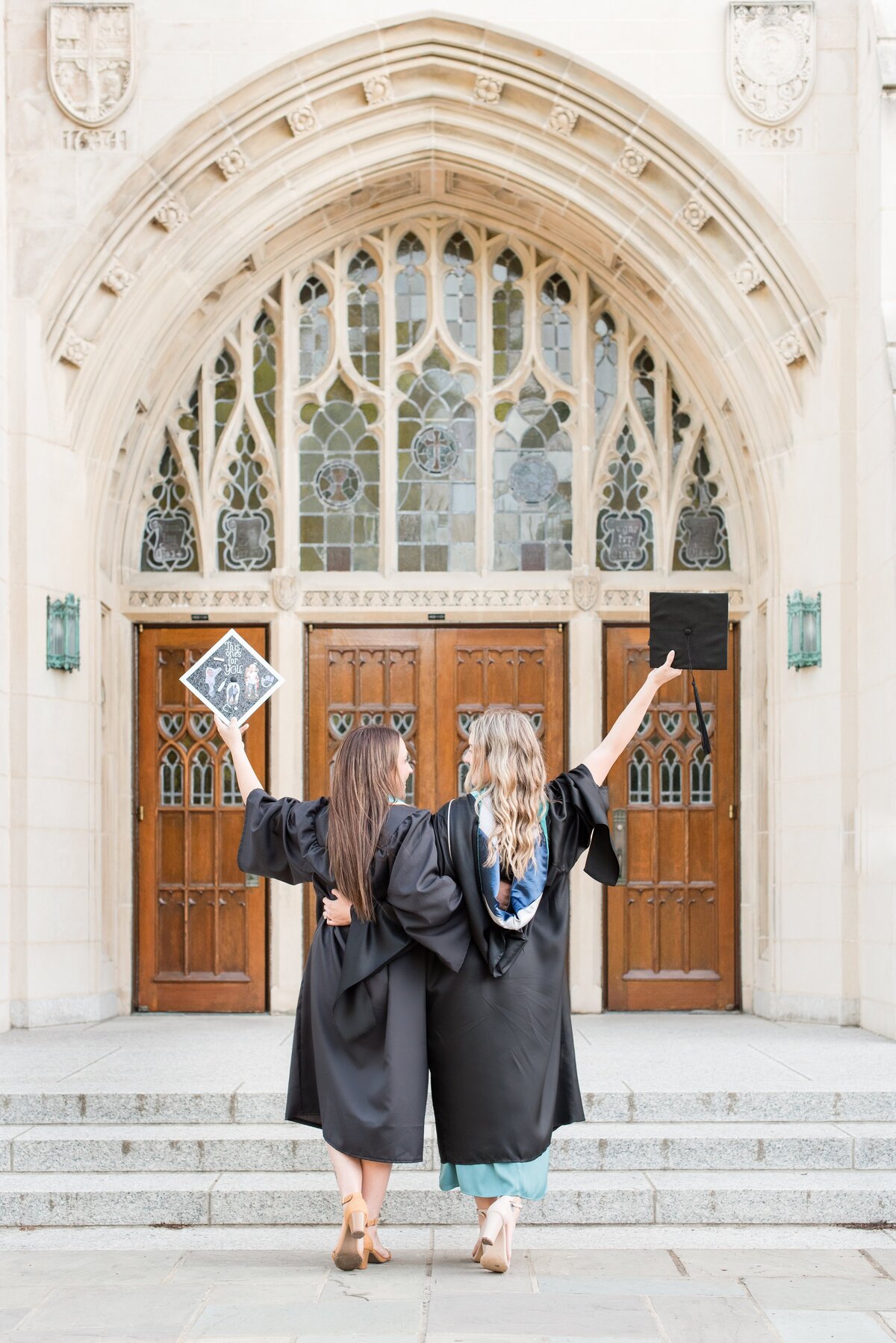 graduate sisters in regalia