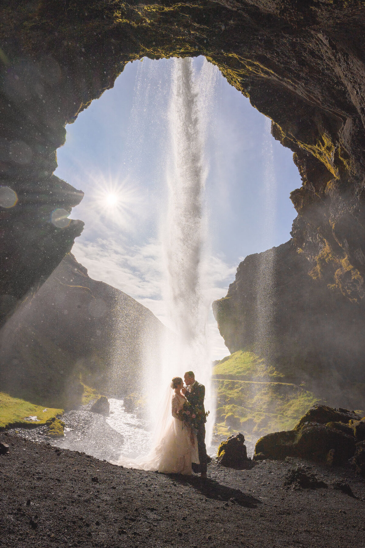 Iceland-behind-waterfall-elopement-kvernufoss