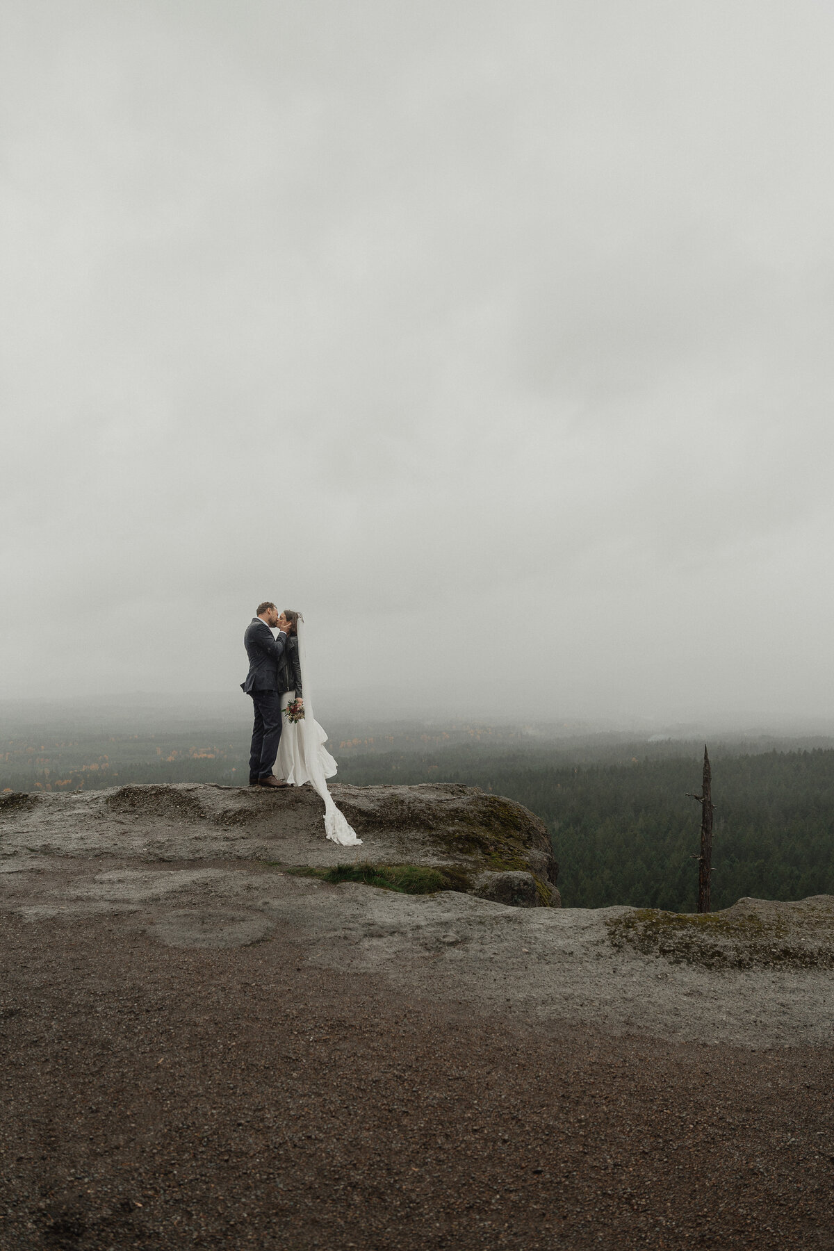 Bride and Groom during elopement photos at little mountain in Errington by Latitude 49 photography