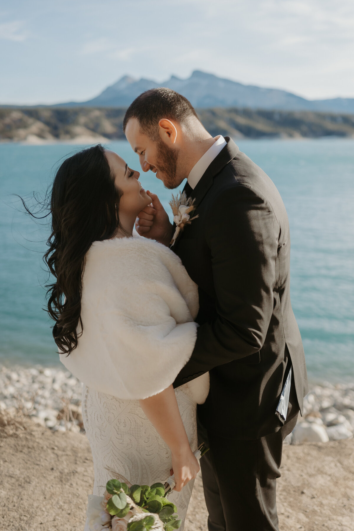 Destination wedding photograph of the happy couple going to kiss