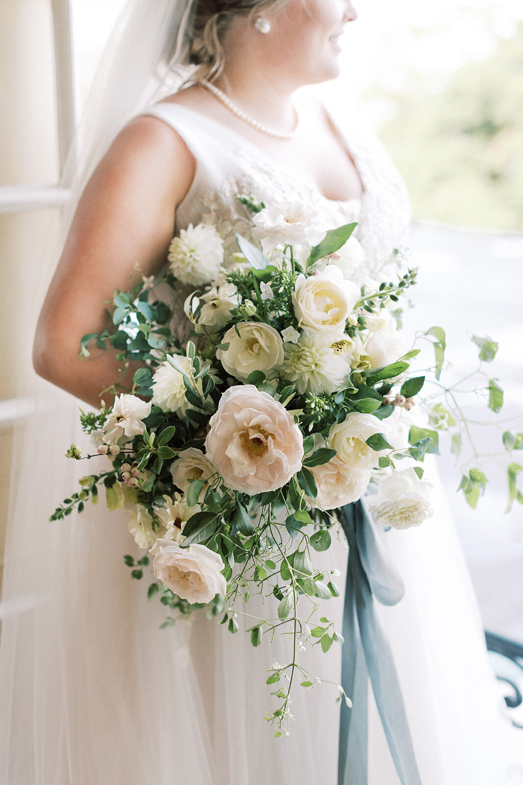 Bride with Spring Garden Wedding Bouquet