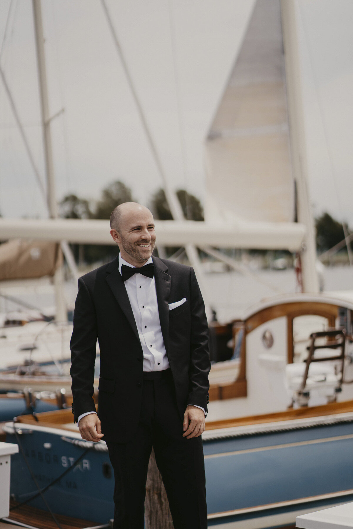 Groom outside near Chesapeake Bay