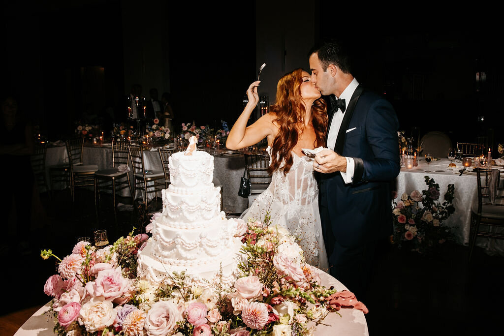bride and groom cutting vintage wedding cake