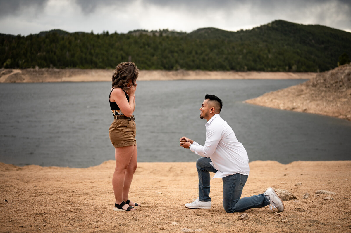 Valerie's boyfriend proposing on a beach