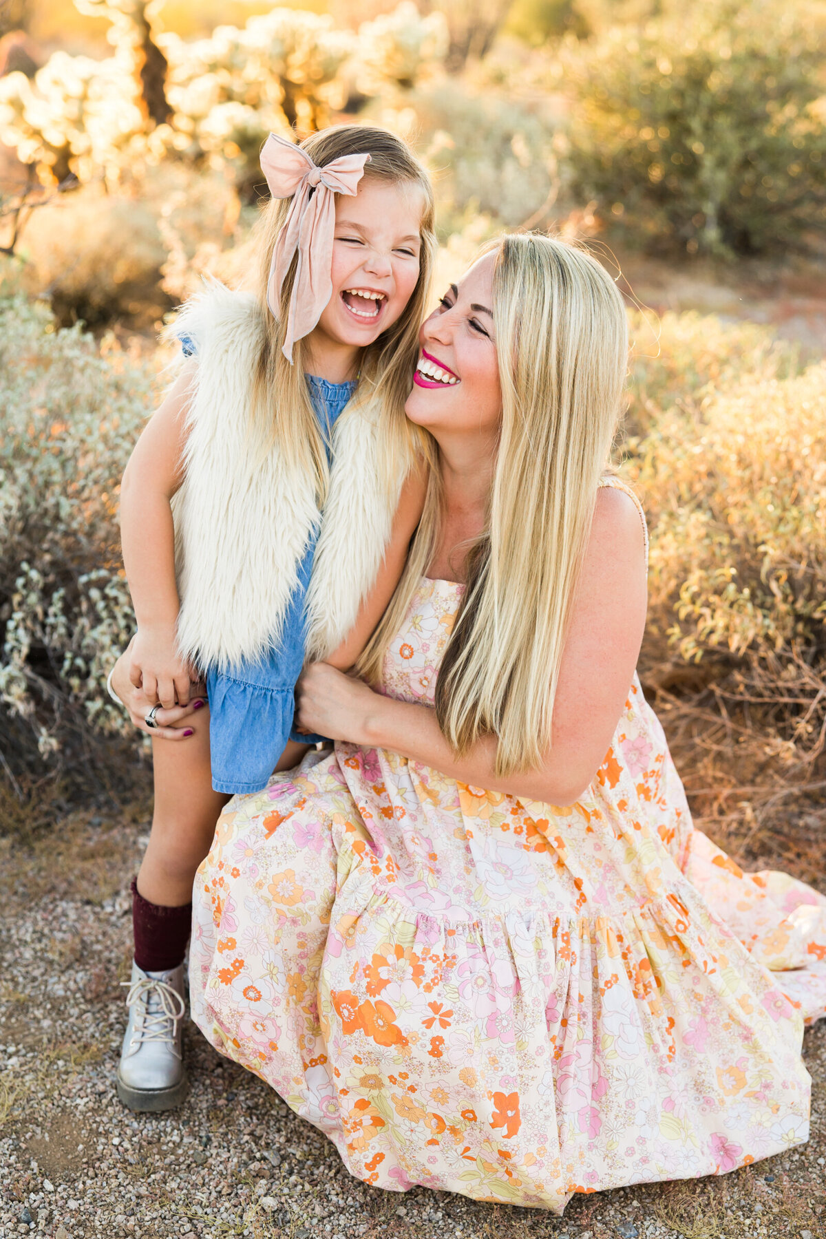 mom and daughter smiling together in Scottsdale desert